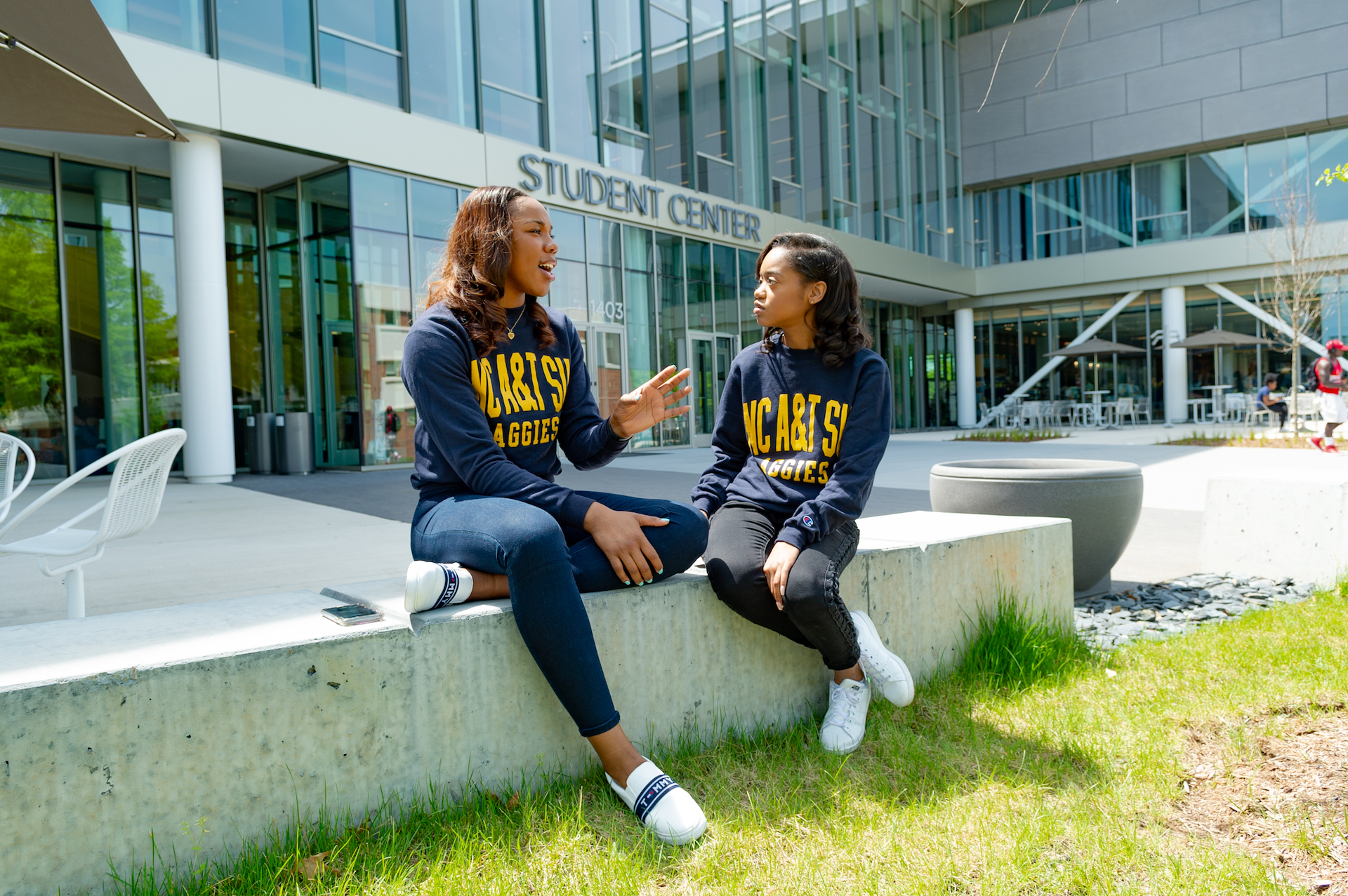 2 female students outside of the student center