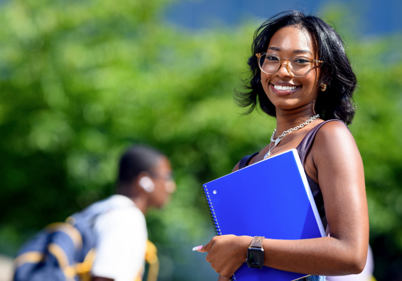 an a and t students smiles for the camera