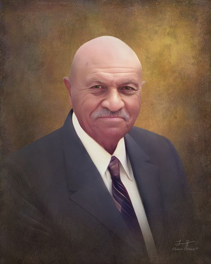 A formal portrait of Professor Emeritus Samuel J. Dunn with warm earthy tones.