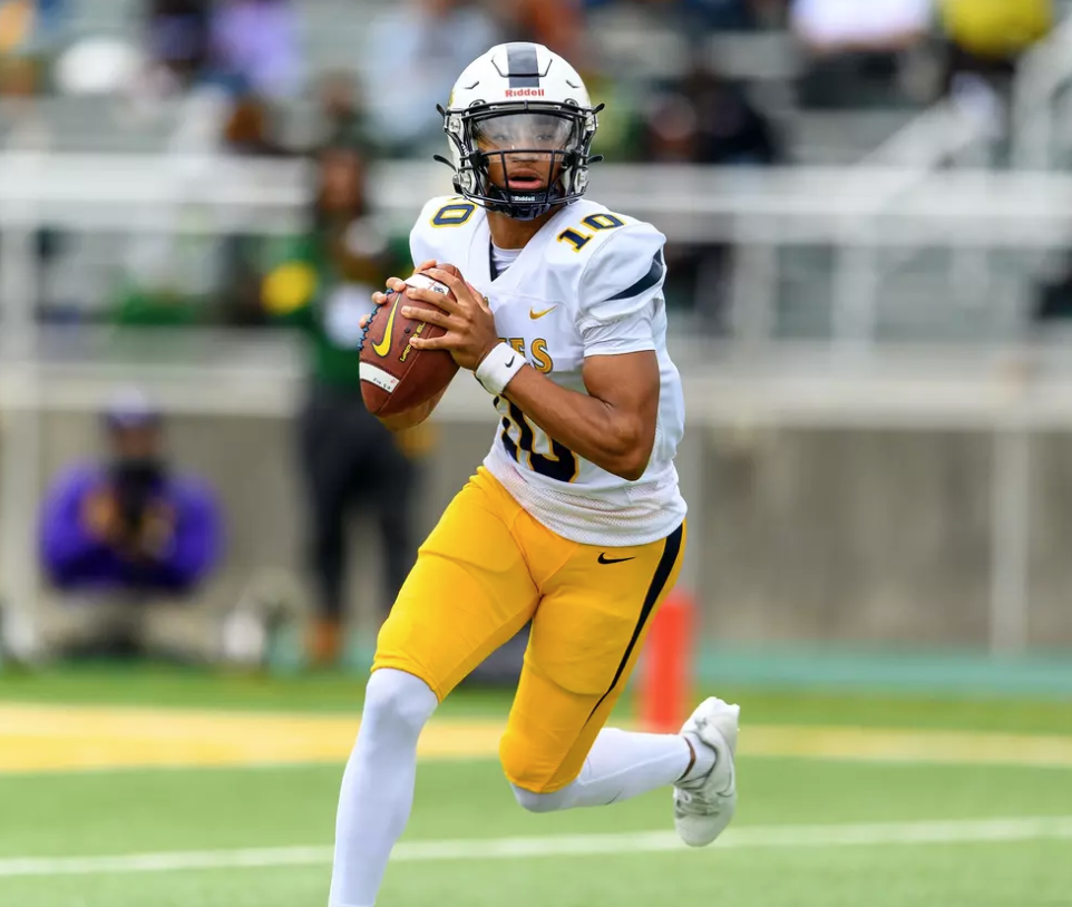 Aggie quarterback sets up to pass against Norfolk State