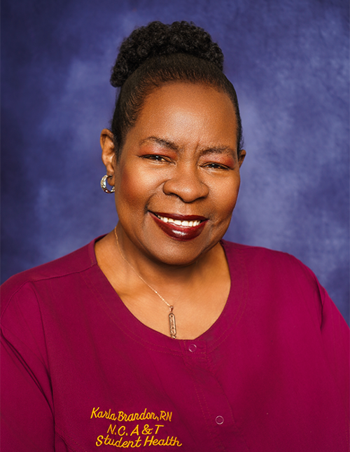 Nurse Brandon in professional photo in her scrubs
