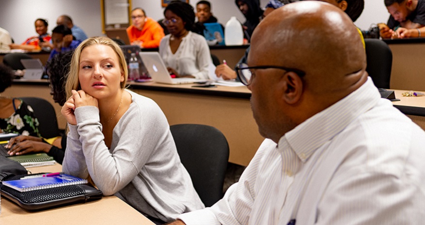 Two student collaborating in class