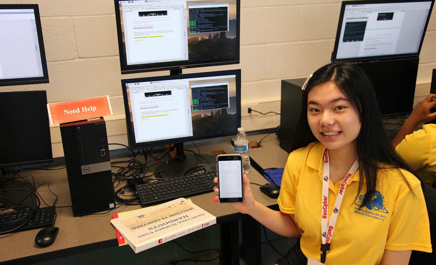 A young student shows off their app