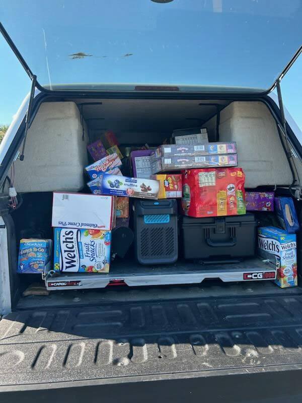 emergency supplies packed in the back of a UPD vehicle