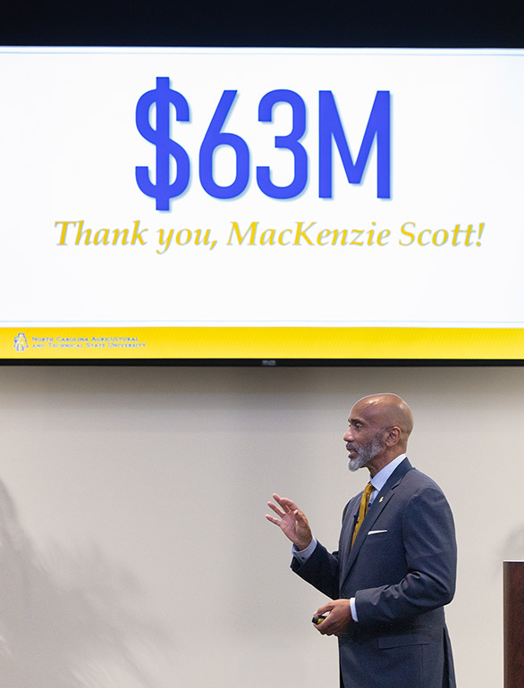 chancellor martin discussing gift