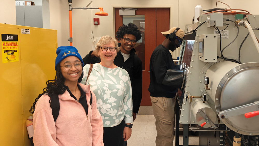 Students and Dr. Kurkalova in a lab for the Department of Energy research initiative 